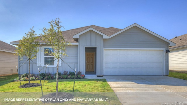 ranch-style home featuring a front yard and a garage