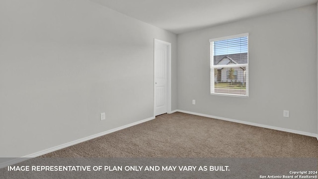 view of carpeted spare room