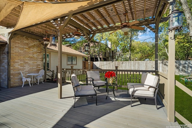 wooden deck with a pergola and ceiling fan