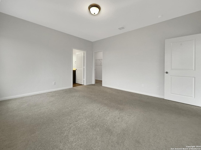 unfurnished room featuring carpet floors