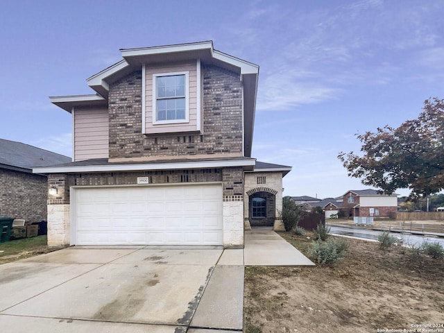 view of front of home featuring a garage