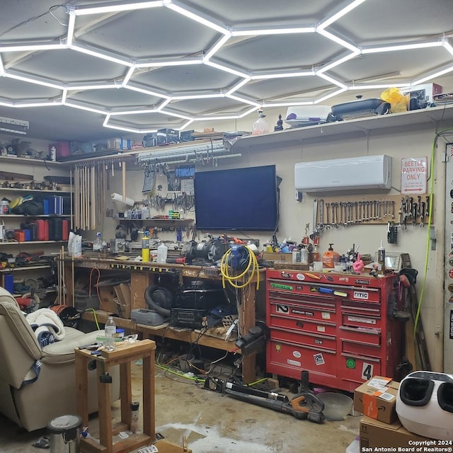 interior space with a workshop area and concrete floors