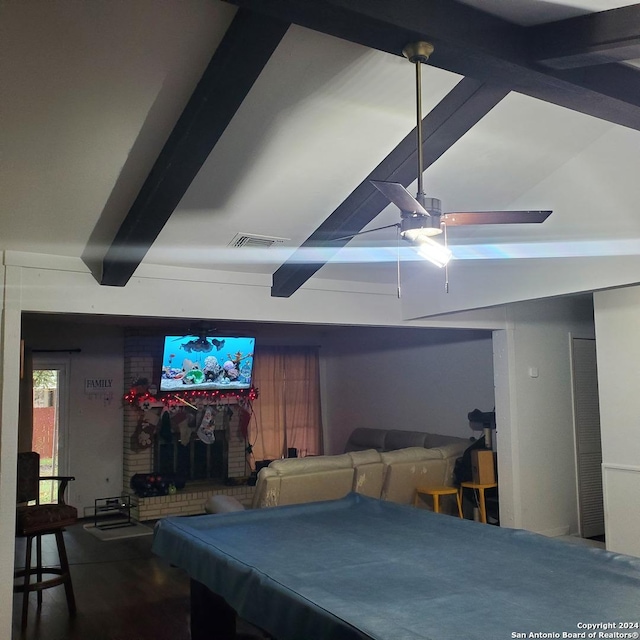 game room with beam ceiling, ceiling fan, and pool table