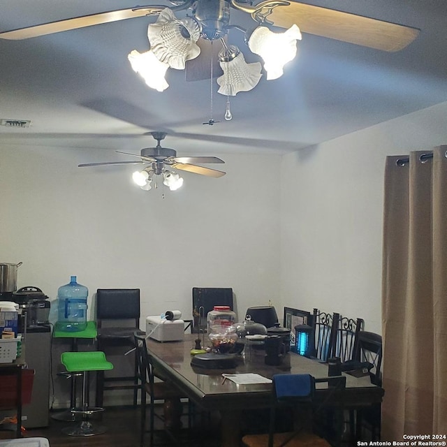 dining room featuring ceiling fan