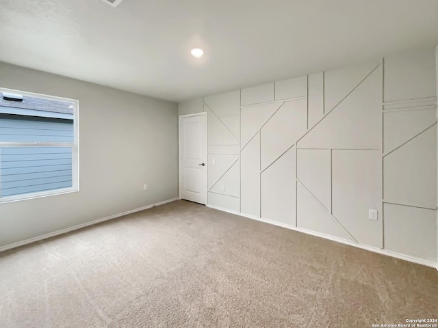 unfurnished bedroom featuring carpet floors