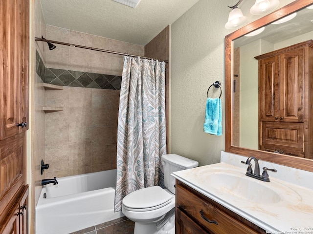 full bathroom featuring vanity, shower / bath combination with curtain, tile patterned flooring, toilet, and a textured ceiling