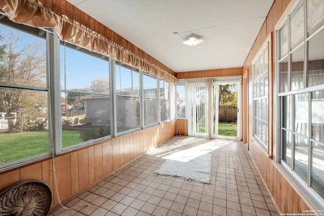 unfurnished sunroom with a healthy amount of sunlight