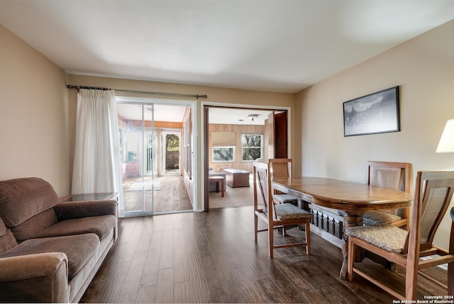 dining area with dark wood-type flooring