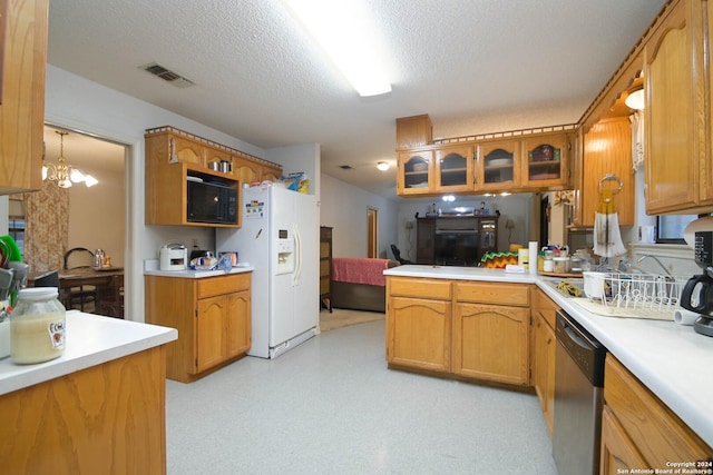 kitchen featuring dishwasher, white fridge with ice dispenser, a textured ceiling, black microwave, and a chandelier