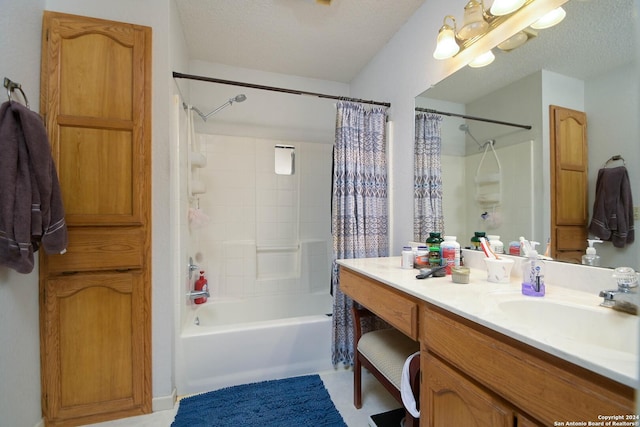 bathroom featuring vanity, shower / tub combo, and a textured ceiling