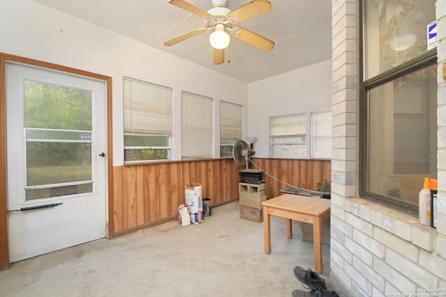 sunroom / solarium with ceiling fan