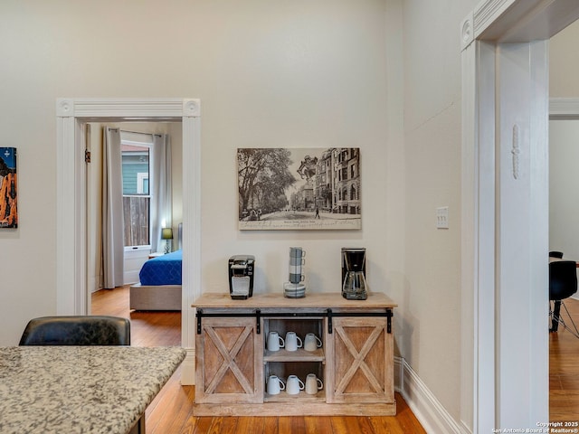 hall featuring hardwood / wood-style flooring