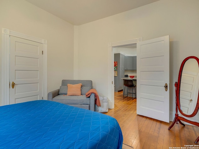 bedroom featuring hardwood / wood-style floors