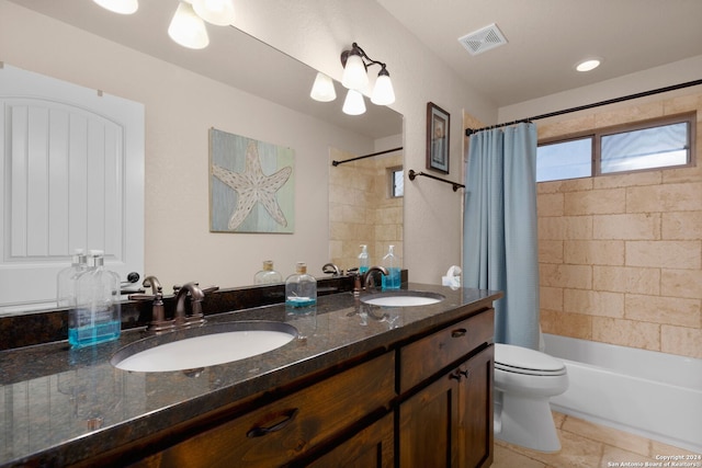 full bathroom with tile patterned flooring, shower / bath combination with curtain, toilet, and vanity