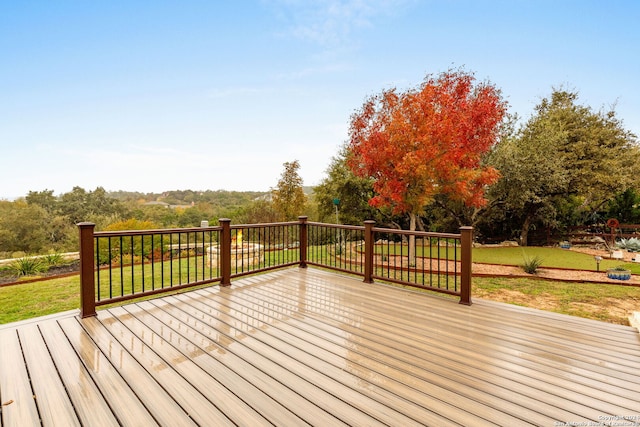 deck featuring a lawn