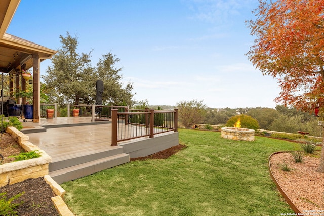 view of yard with a wooden deck