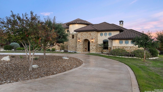 view of mediterranean / spanish-style house