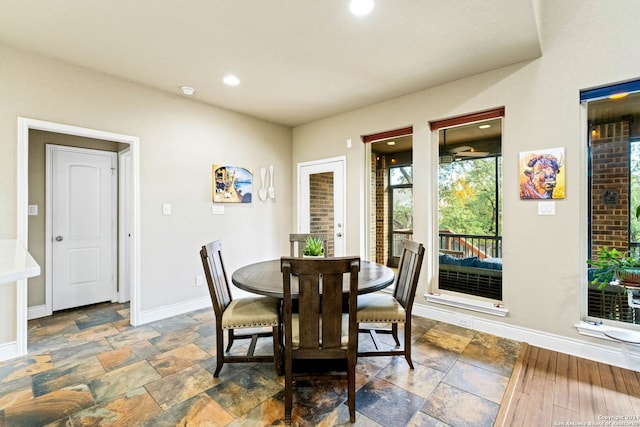 dining room with wood-type flooring