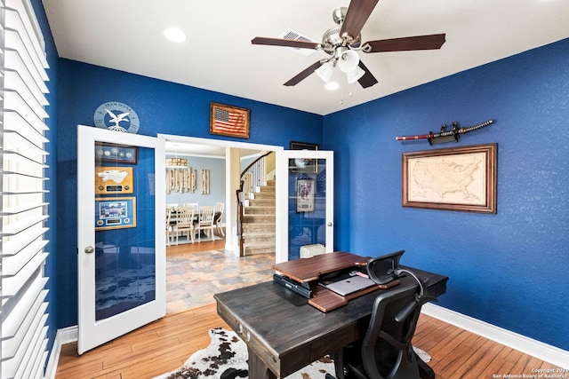 office space featuring wood-type flooring and ceiling fan