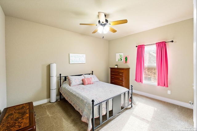 bedroom with ceiling fan and carpet floors