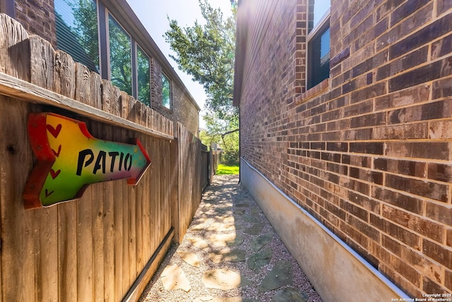 25828 Green Ter, San Antonio, TX 78255 - view of side of home featuring brick siding