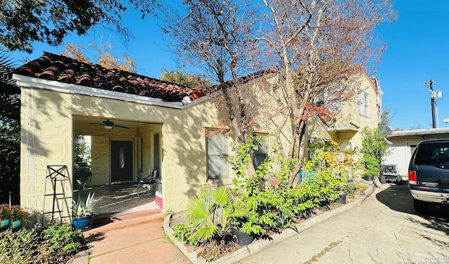 mediterranean / spanish house with ceiling fan