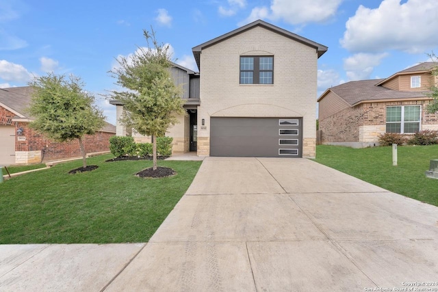 view of front facade featuring a front yard and a garage