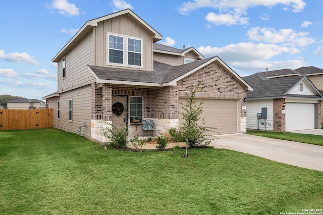 view of front of property with a front lawn and a garage