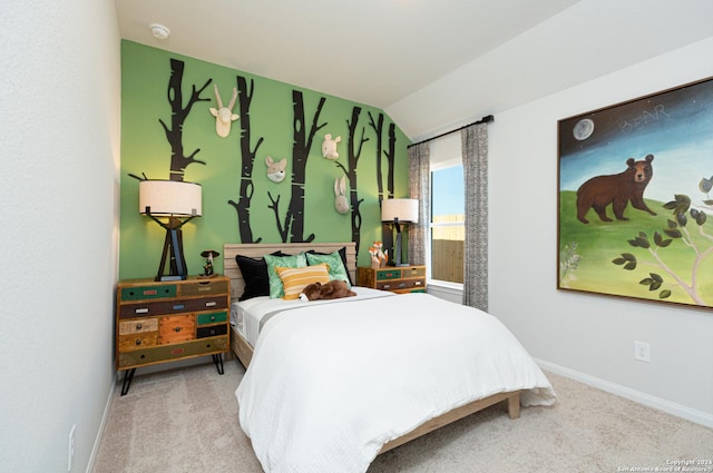 bedroom with light carpet and lofted ceiling