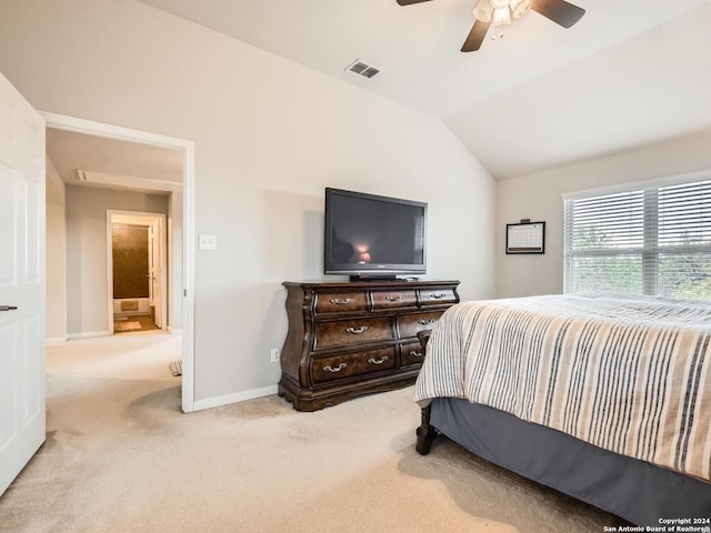 carpeted bedroom featuring vaulted ceiling and ceiling fan