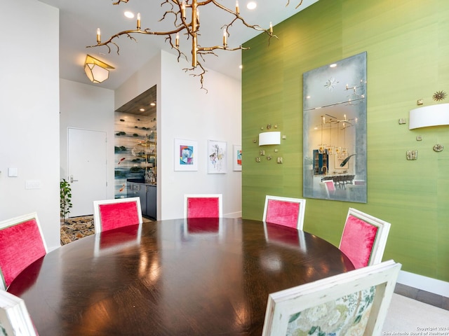 dining space featuring a notable chandelier