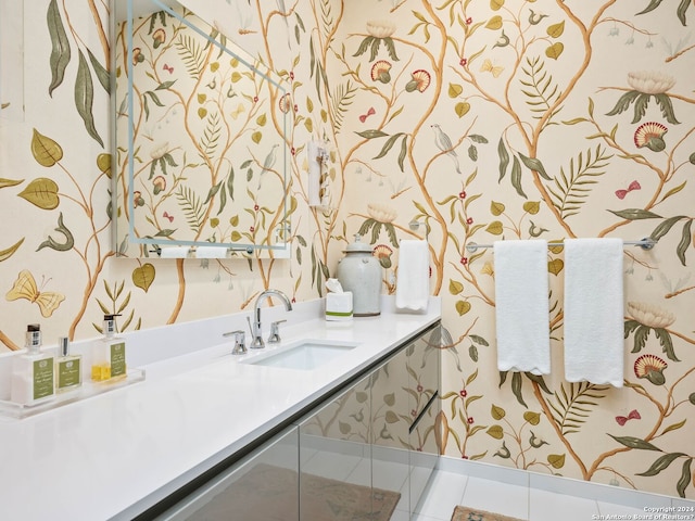 bathroom with tile patterned flooring and vanity