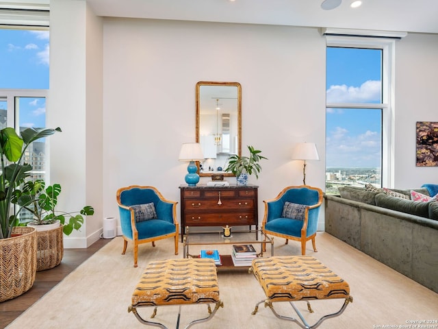 living room with hardwood / wood-style flooring and a wealth of natural light