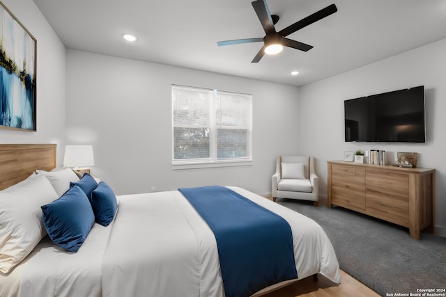 bedroom featuring ceiling fan and carpet floors