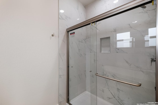 bathroom featuring walk in shower