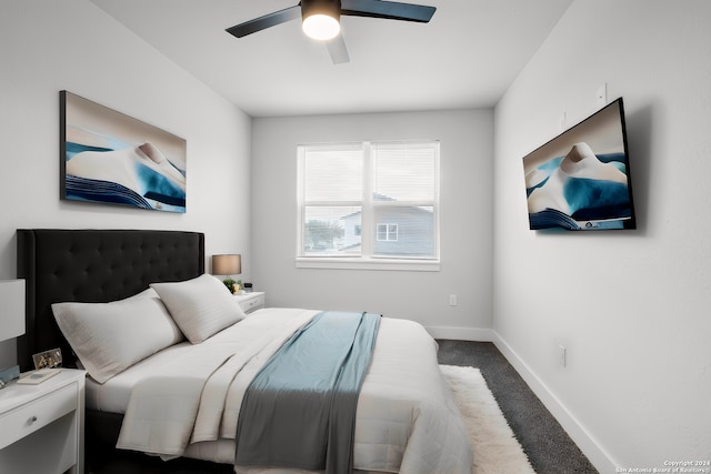 carpeted bedroom with ceiling fan