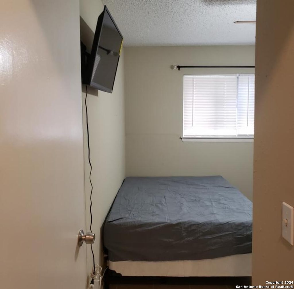 bedroom with a textured ceiling