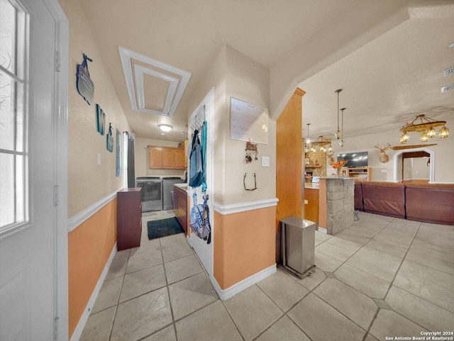 hallway featuring light tile patterned floors