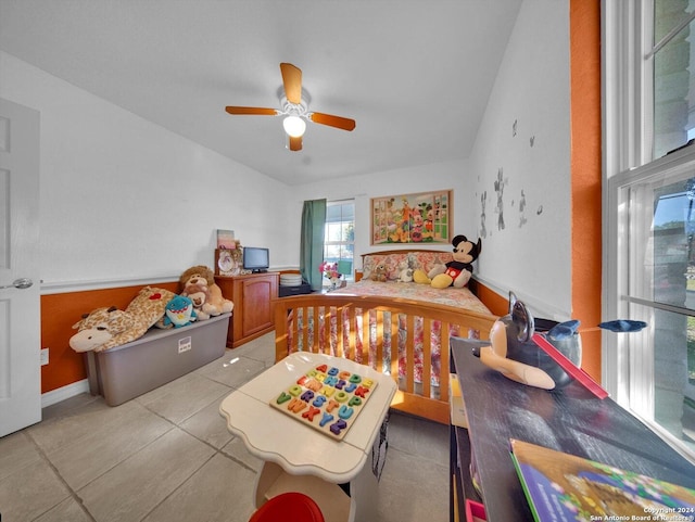 bedroom featuring ceiling fan and light tile patterned flooring