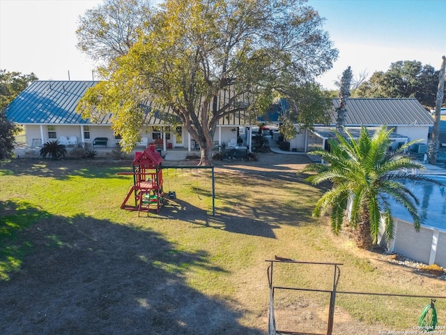 view of yard featuring a playground