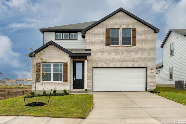 front facade featuring central AC, a front lawn, and a garage