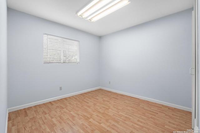 spare room featuring light hardwood / wood-style floors