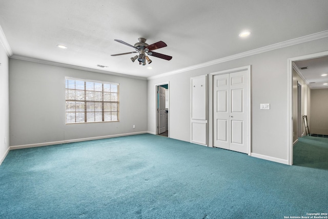 unfurnished bedroom with carpet flooring, ceiling fan, and crown molding