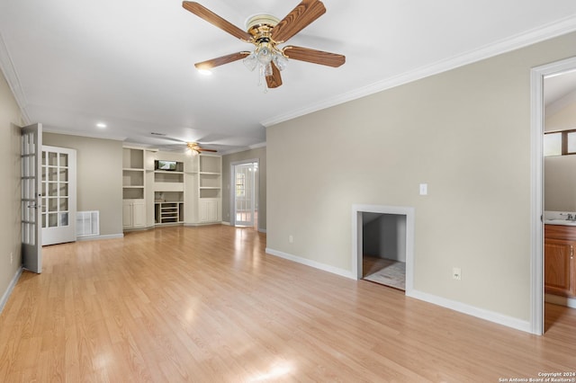 unfurnished living room with light hardwood / wood-style floors, ceiling fan, and crown molding