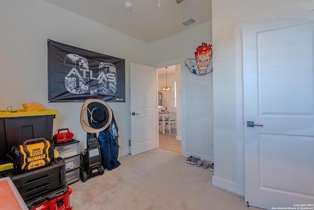 interior space featuring light colored carpet