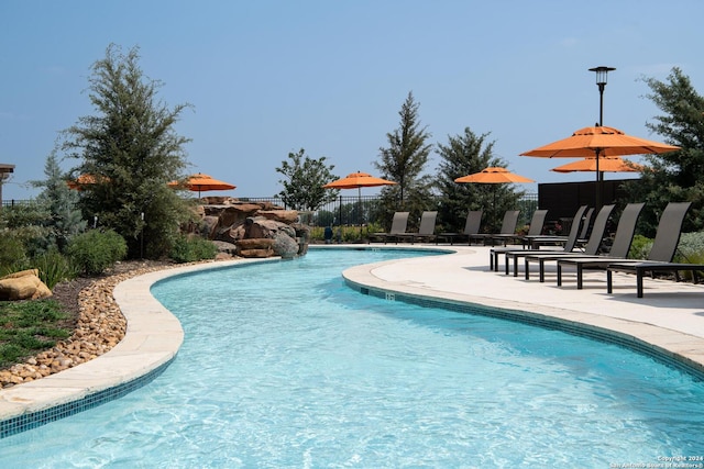 view of pool featuring a patio area