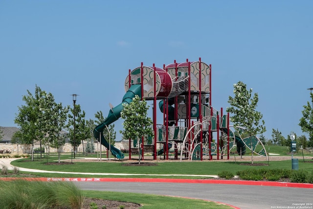 view of playground featuring a yard