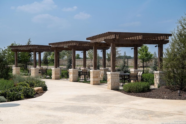 view of property's community featuring a pergola