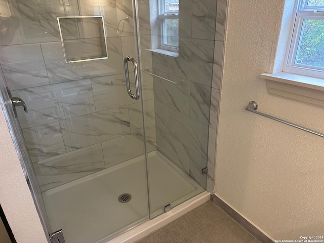 bathroom with an enclosed shower