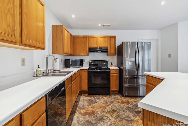 kitchen featuring sink and black appliances